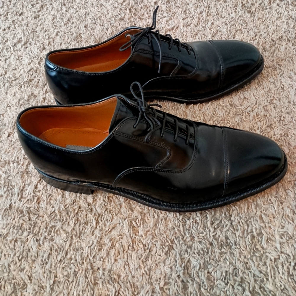 A pair of black, size 10, Johnston and Murphy shoes